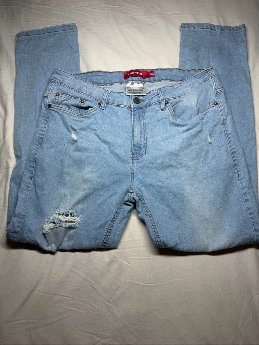 Ring of Fire Light Blue Straight Leg Jeans with Distressed Knee
